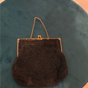 Elegant Black Beaded Clutch with Gold Accents